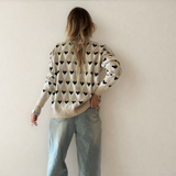 Brynlee Geometric Heart Print Ribbed Trim Loose Sweater