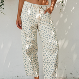 Aspen Grommet Knot Waist Floral Barrel Leg Jeans