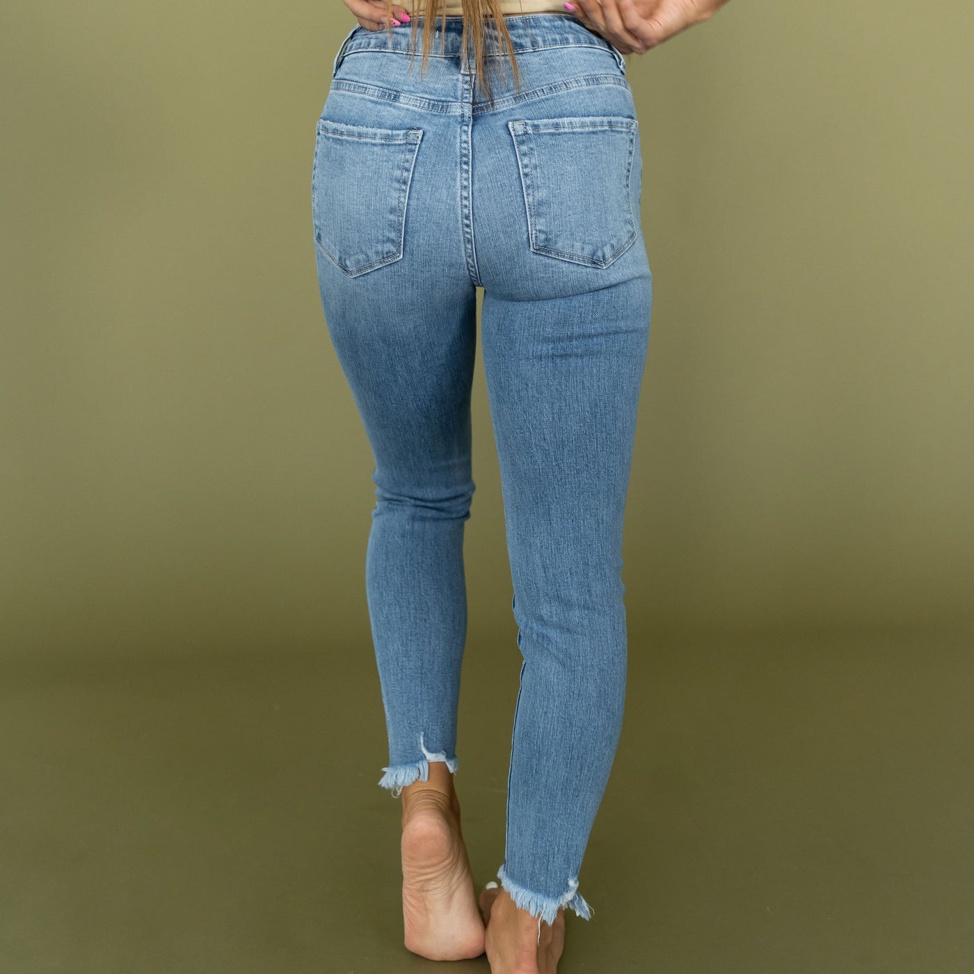 High-Rise Button Fly Raw Hem Ankle Jeans