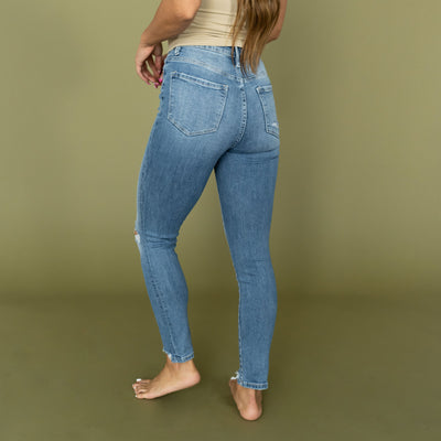 Distressed High-Rise Super Skinny Ankle Jeans